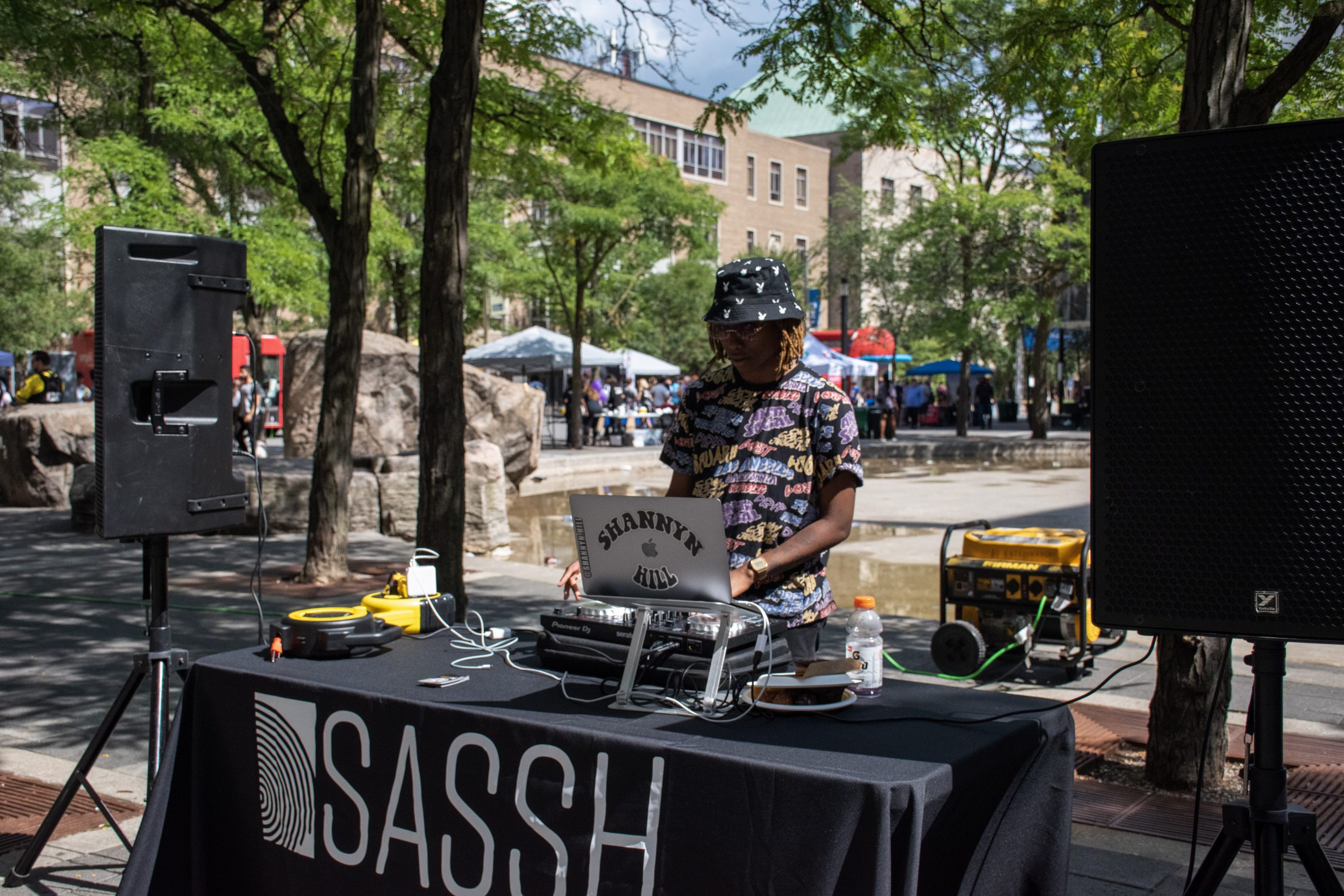 DJ in front of SASSH table