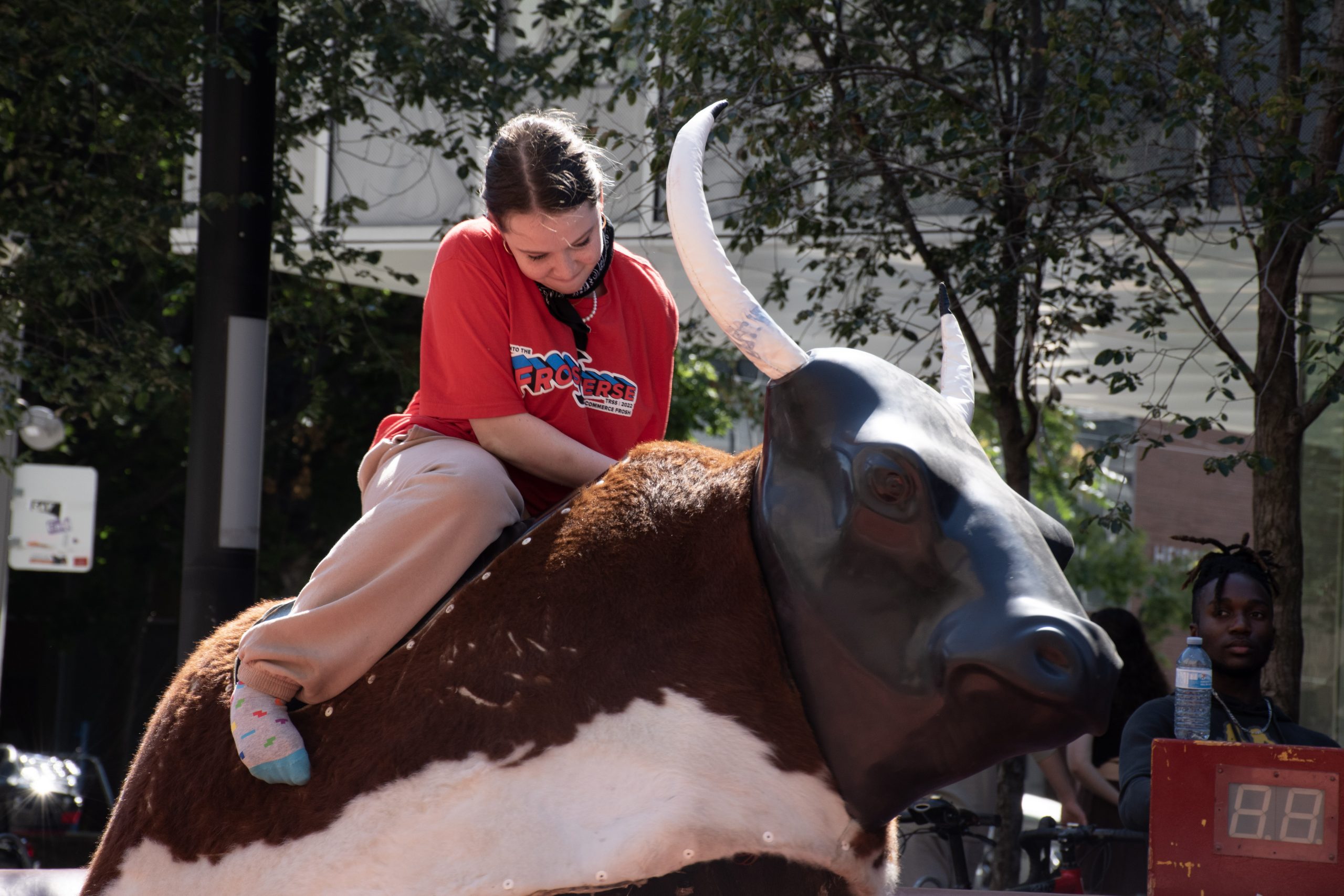 girl riding mechanical bull